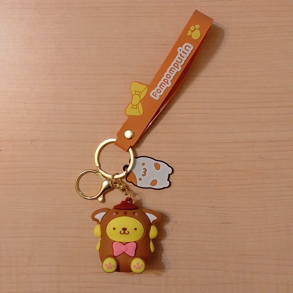 🆕 Sanrio Pompompurin Figurine Keychain Bag Clip